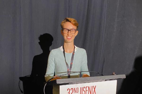 Giulia Scaffino on the stage at the USENIX Security Symposium.